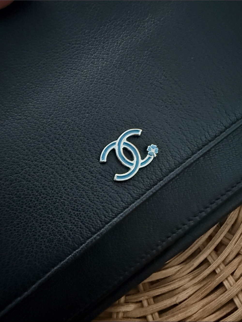 CHANEL Black Leather Shoulder Bag with Silver-Tone CC and Blue Enamel Detail